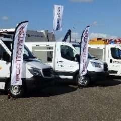 Ecotrommel - auto met vlaggen